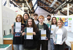 Brief Cases winners with their certificates