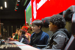 Children playing a computer game in the sports arena