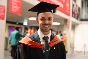 Nathan Coley in his graduation cap and gown