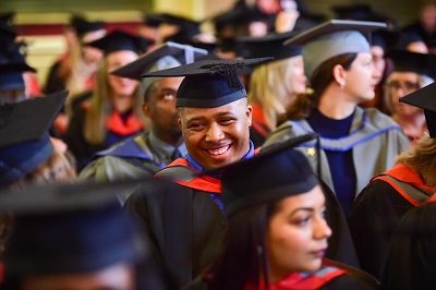 A group of students dressed for graduation