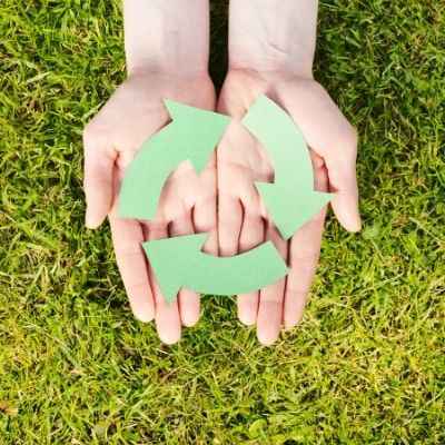 Hands with the Recycling arrow symbol