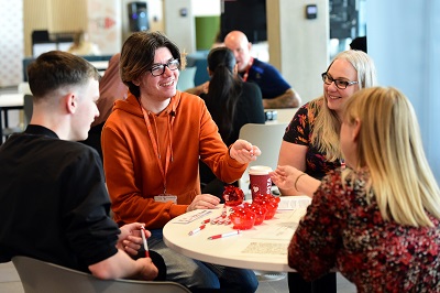  Prospective students talking to advisors in Staffordshire University's Clearing Hub