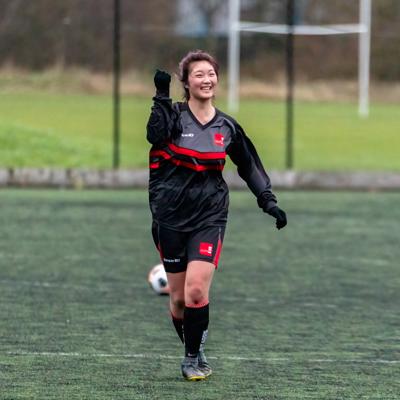 Staffs player celebrate with raised arm in the air